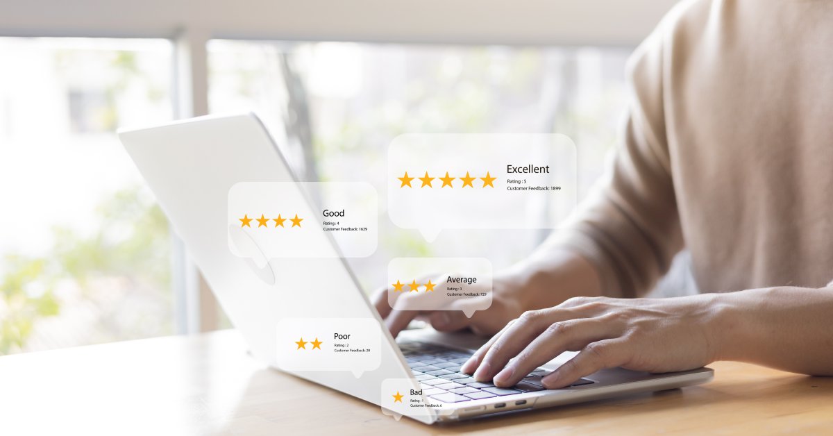 A person using a laptop, surrounded by floating bubbles displaying star ratings and reviews such as "good" and "poor."
